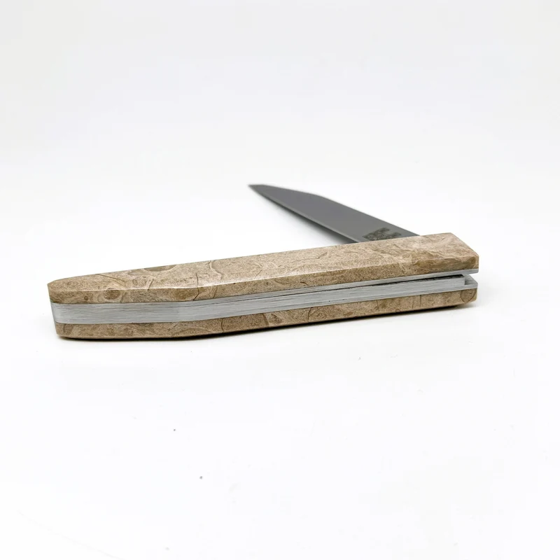 Couteau et son manche en Marbre Lunel (utilisé pour le dallage de la nef de Notre Dame de Paris)