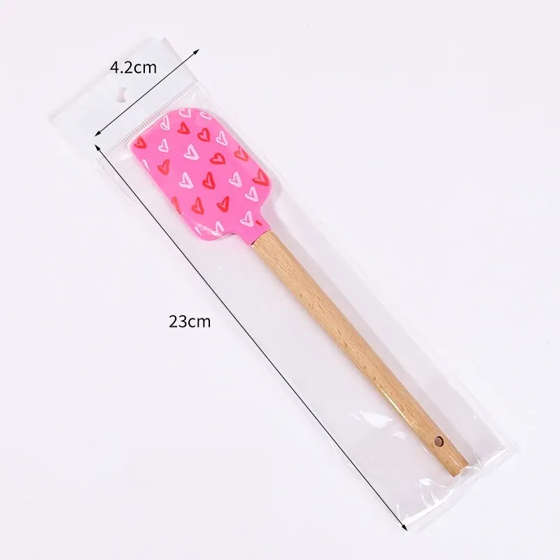 Spatule en Silicone Motifs Cœurs avec Manche en Bois