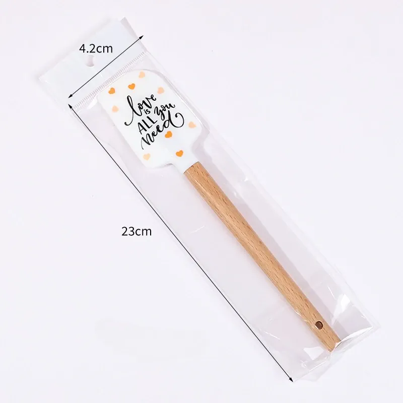 Spatule en Silicone Motifs Cœurs avec Manche en Bois