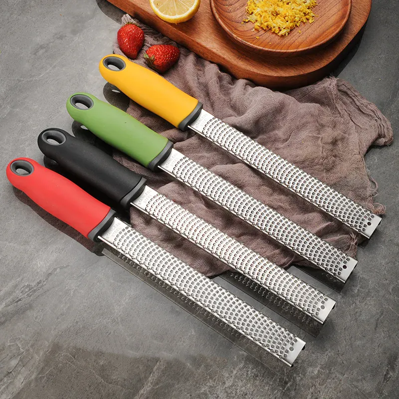 Zesteur en Inox pour Fruits et Fromage - 4 Lames Poignée Antidérapante