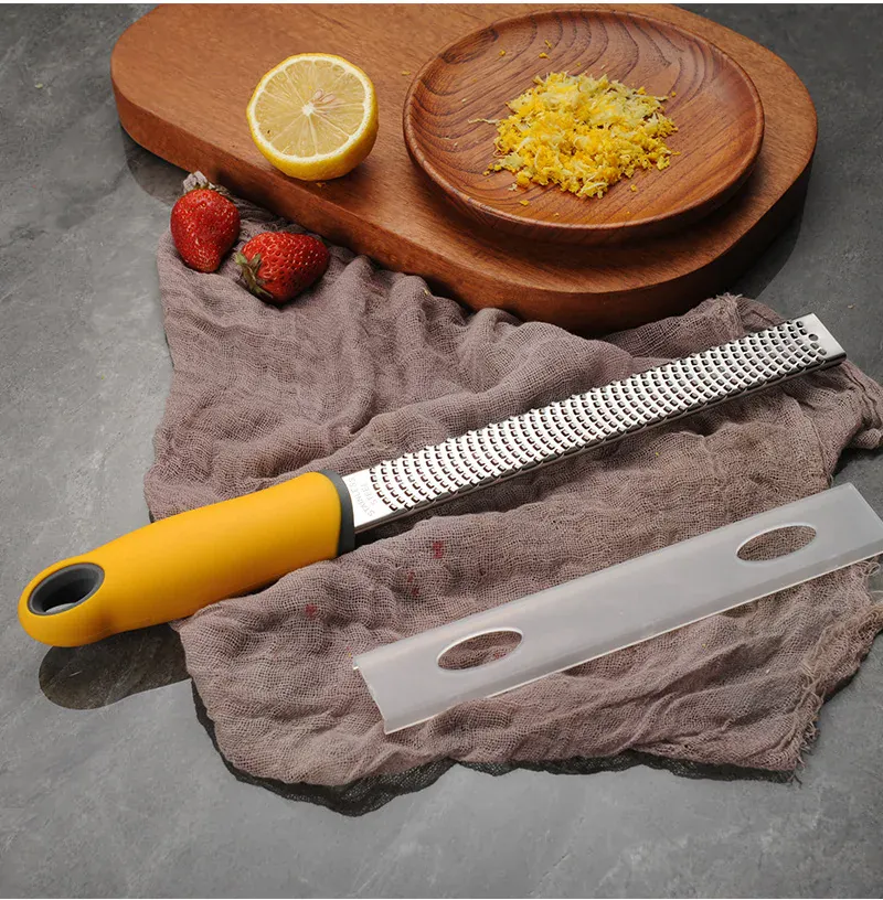 Zesteur en Inox pour Fruits et Fromage - 4 Lames Poignée Antidérapante