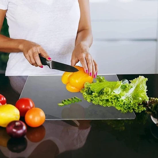 Planche a decouper avec bord d'arrêt ™