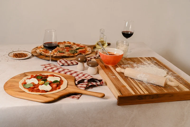 Planche de service pour pizza TeakHaus Canoe en teck 43x26x1,5cm