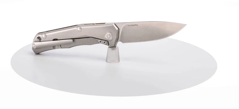 Couteau pliant LionSteel Tre manche G10 / titanium 10cm