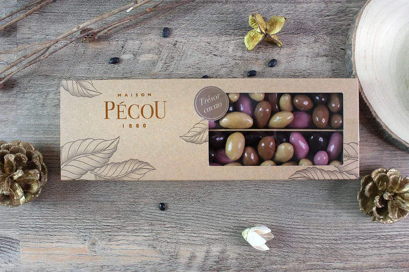 Amandes grillées Pécou Trésor Cacao enrobées de chocolats Ruby noir lait et doré