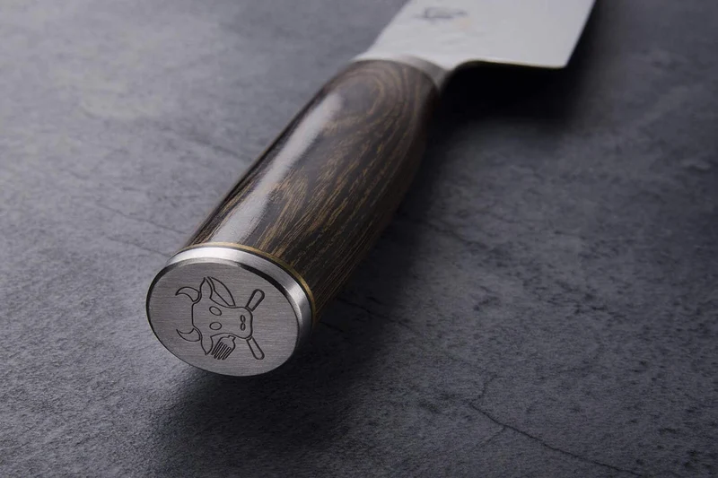 Couteau santoku Kai Shun Premier Tim Malzer 18cm + kit de soin