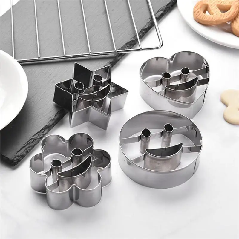 Emporte-pièces en inox - Set de 4 formes décoratives souriantes pour Noël