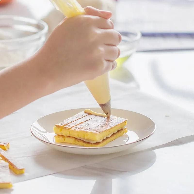 Poches à douille en acier inoxydable avec 100 sacs jetables pour pâtisserie