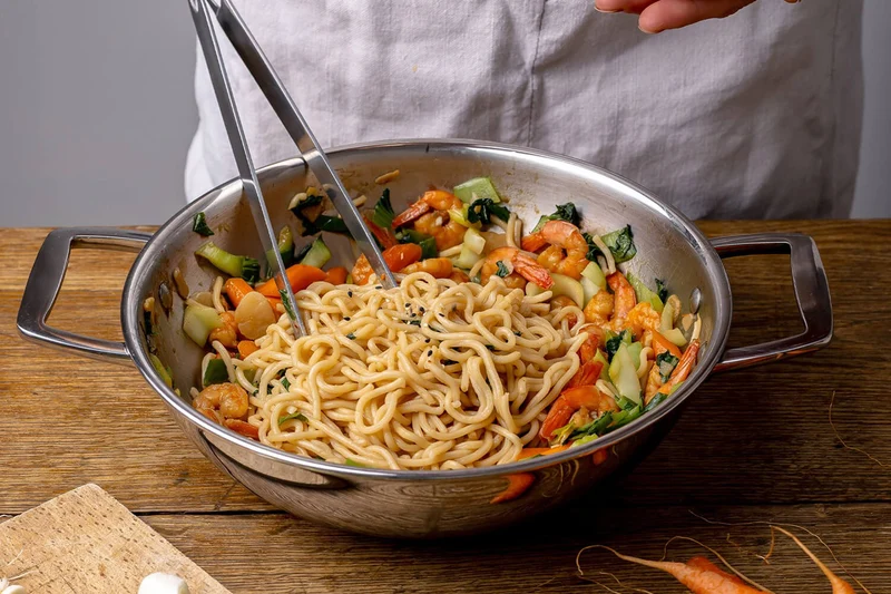 Wok Cristel Castel'Pro en acier inoxydable 18/10 3 ply avec 2 anses fixes
