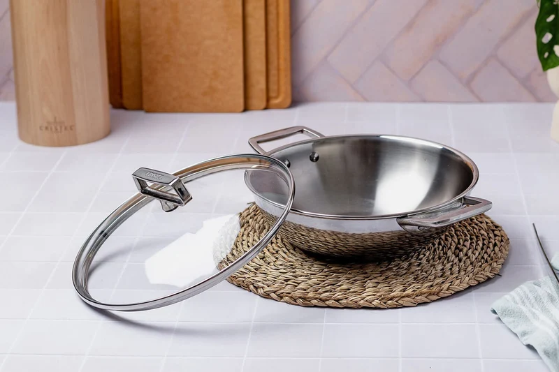 Wok Cristel Castel'Pro en acier inoxydable 18/10 3 ply avec 2 anses fixes
