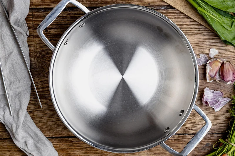 Wok Cristel Castel'Pro en acier inoxydable 18/10 3 ply avec 2 anses fixes