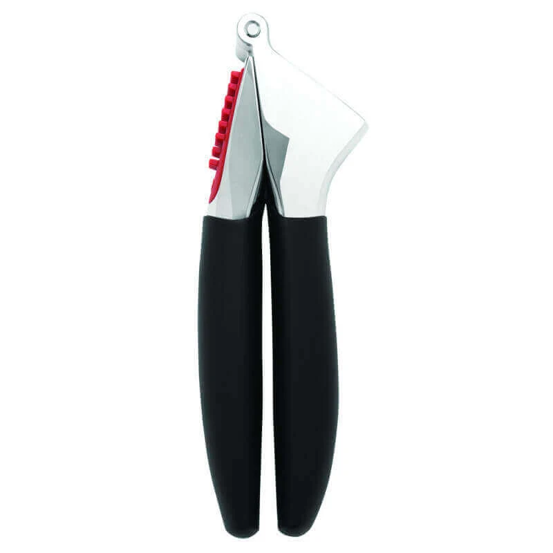 Presse-ail OXO avec brosse à picots intégrée