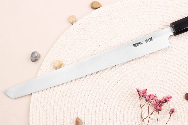 Couteau sakimaru takohiki japonais artisanal 27cm Sakai Takayuki Byakko manche en ébène + étui