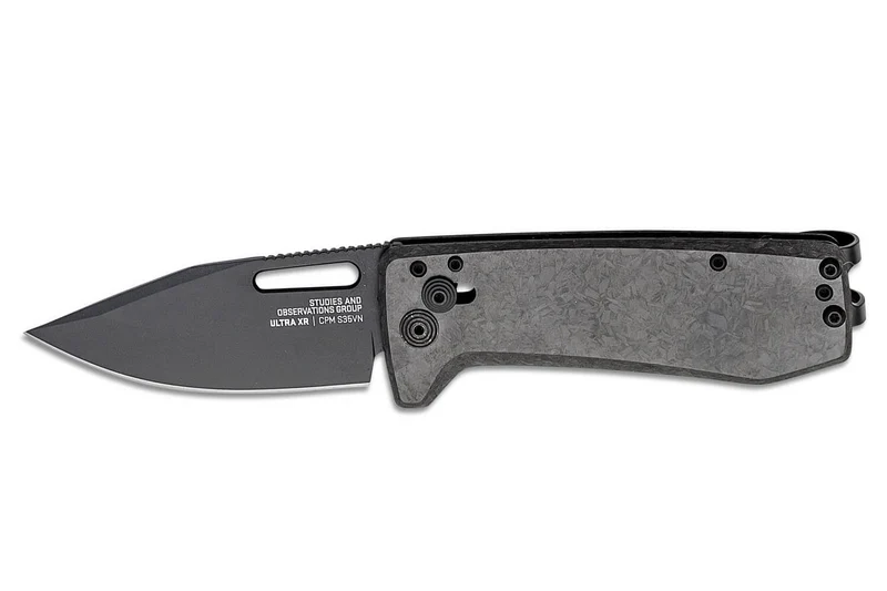 Couteau pliant SOG Ultra XR SGULTRAXRXHPBK manche en fibre de carbone noir 9,1cm