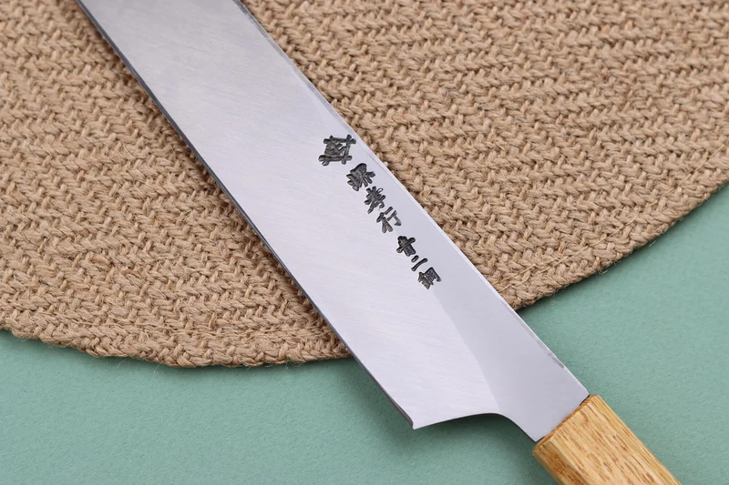 Couteau sakimaru takohiki japonais artisanal Sakai Takayuki Homura Guren 30cm