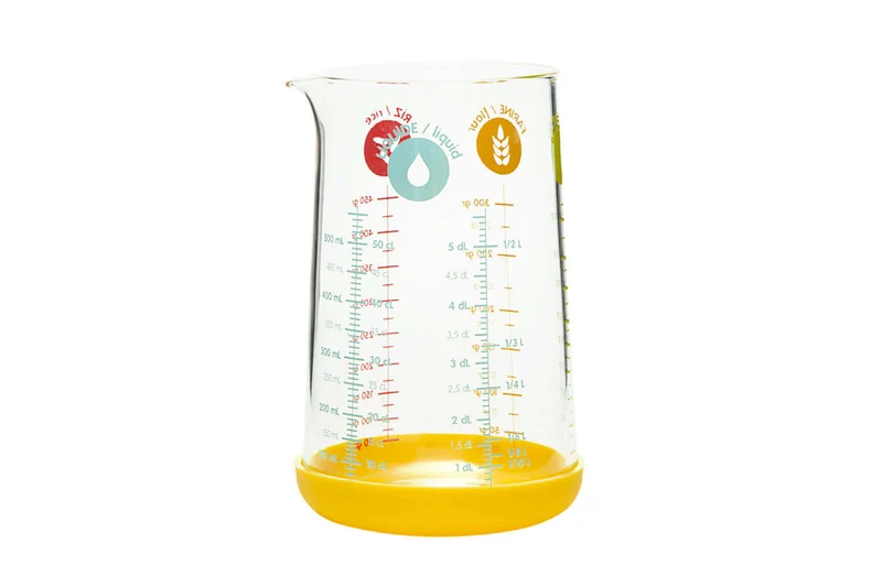 Verre doseur Pebbly en verre borosilicate et base en silicone