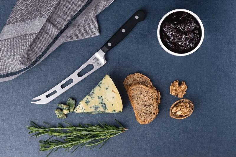 Couteau à fromage Tramontina Century lame ajourée 15cm manche polycarbonate noir