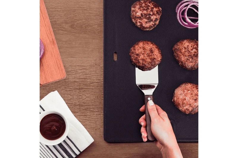 Spatule coudée Tramontina Technobois en inox 25cm