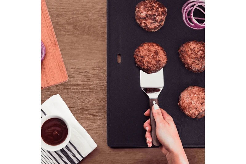 Spatule coudée Tramontina Technobois en inox 27cm