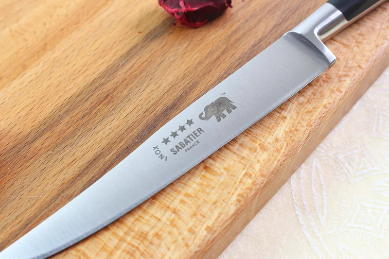 Couteau à steak Sabatier Éléphant Idéal Forgé lame lisse 13cm manche nylon noir