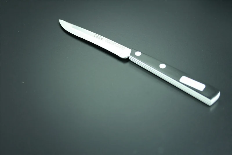 Couteau de table GÜDE Universel 10cm micro-denté manche noir/blanc