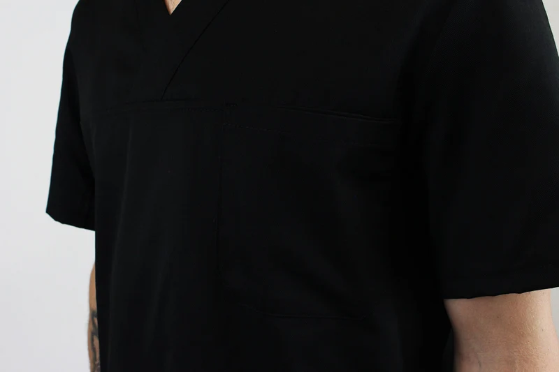 Veste de cuisine unisexe Egochef Leonardo noire polyester et coton à manches courtes