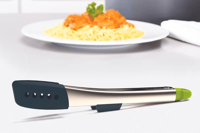 Pince Joseph Joseph Elevate en acier inoxydable et silicone avec reposoir intégré