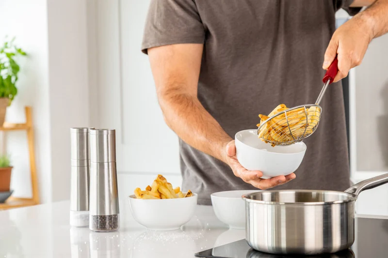 Écumoire Kitchen Aid en acier inoxydable 36,5cm
