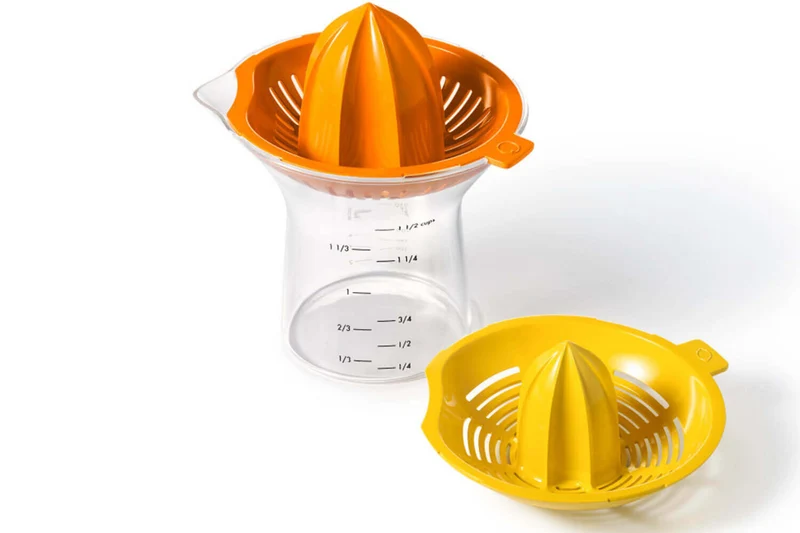 Presse agrumes OXO citron et orange avec récipient doseur