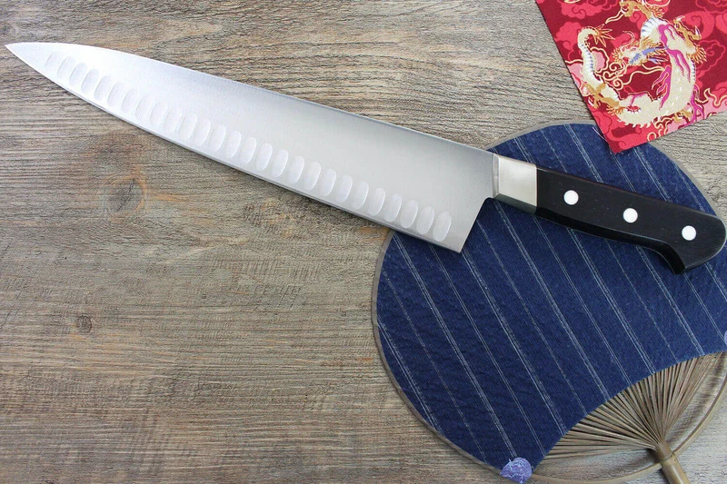 Couteau de chef japonais Misono UX10 alvéolé 30cm