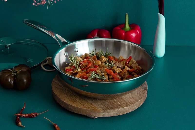 Wok Cristel Castel'Pro en acier inoxydable 18/10 3 ply