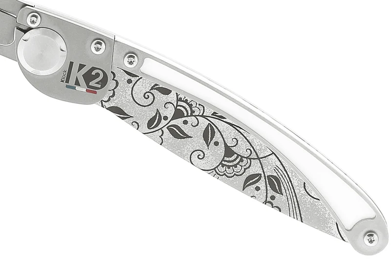 Couteau pliant K2 Elegance K2.20M manche inox décor arabesque 11,5cm + étui suédine