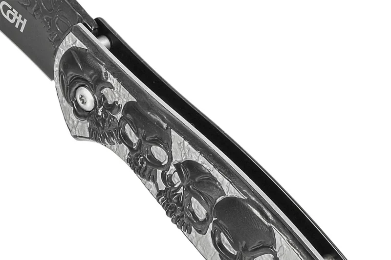 Couteau pliant Herbertz n°564612 tout inox têtes de mort relief 11.5cm