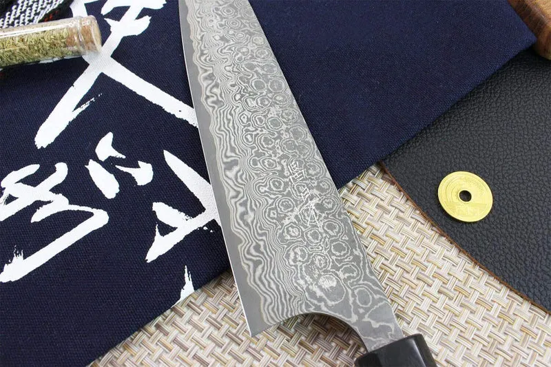 Couteau de chef japonais artisanal Masakage Kumo 21cm damas 63 couches