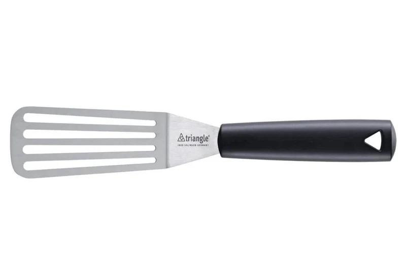 Spatule professionnelle Triangle coudée ajourée flexible en green grip 28,5cm