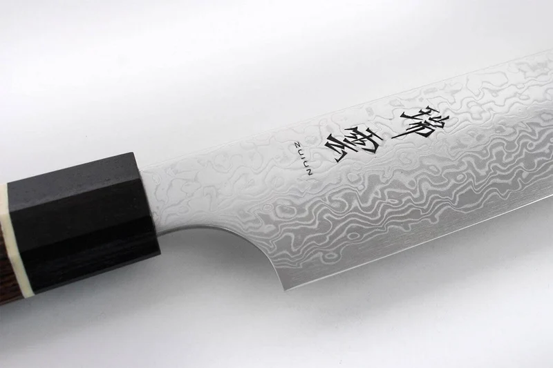 Couteau santoku japonais Kanetsugu Zuiun acier SPG2 damas 18cm