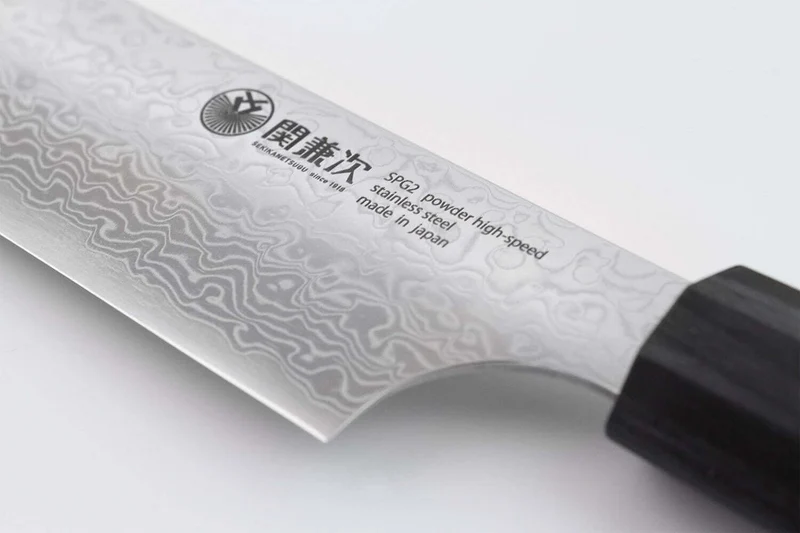 Couteau santoku japonais Kanetsugu Zuiun acier SPG2 damas 18cm