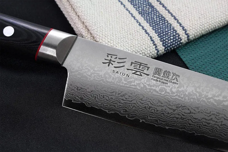 Couteau santoku japonais Kanetsugu Saiun 17cm damas 65 couches