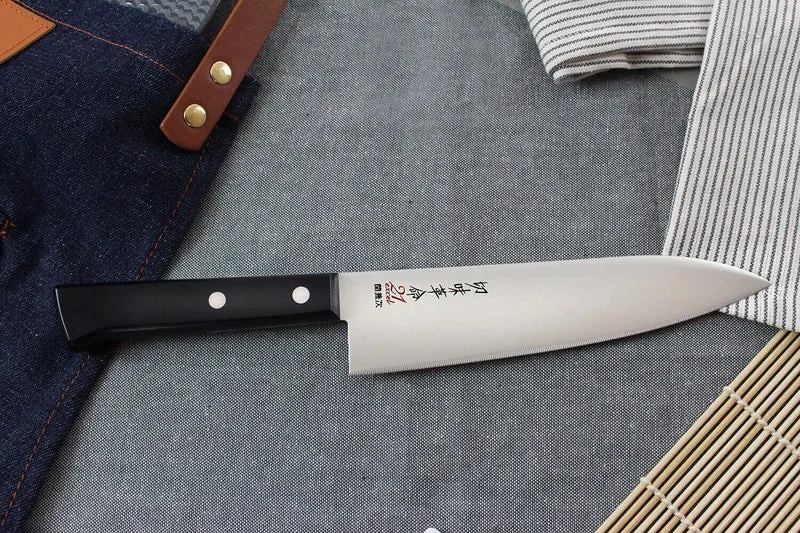 Couteau de chef japonais Kanetsugu Rev 21 lame 18cm micro dentée