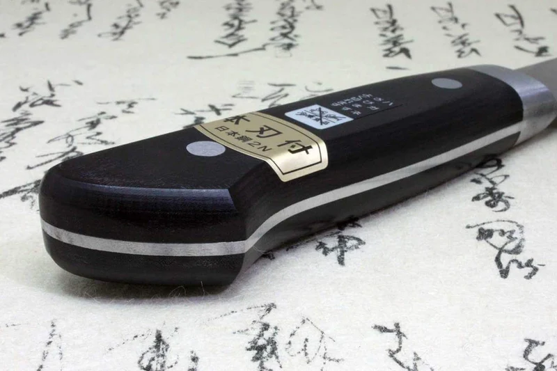 Couteau de chef 27cm Japan Kanetsune acier carbone 2N