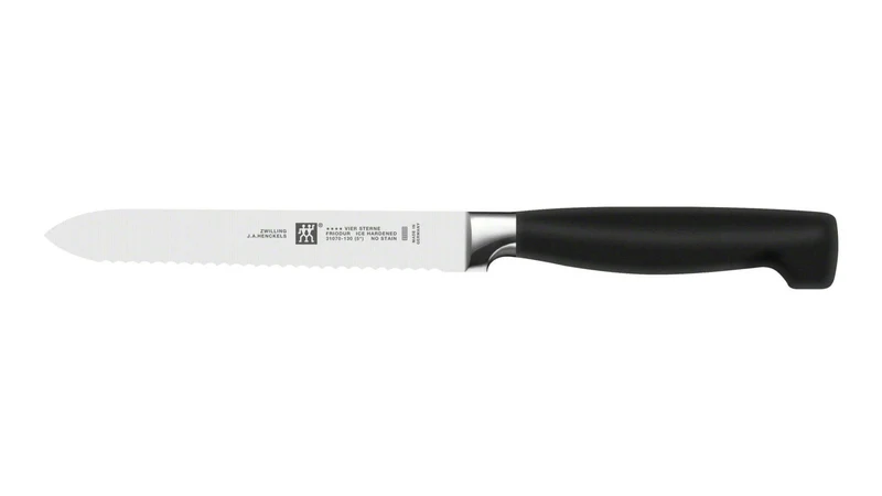 Couteau universel Zwilling Four Star lame dentelée 13cm