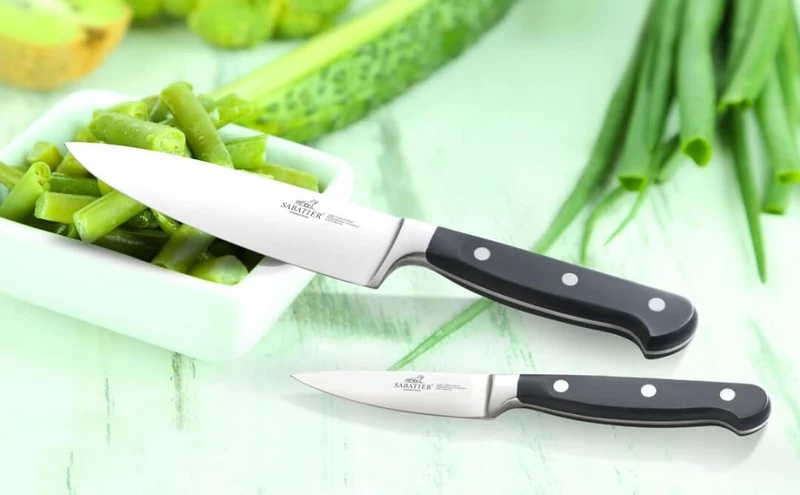 Couteau de chef Sabatier International Pluton 25cm manche 3 rivets
